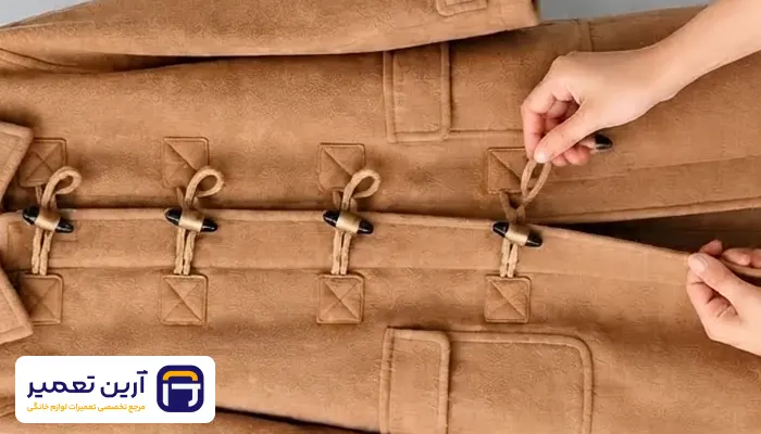 آماده‌ سازی پالتو قبل از شستن در ماشین لباسشویی